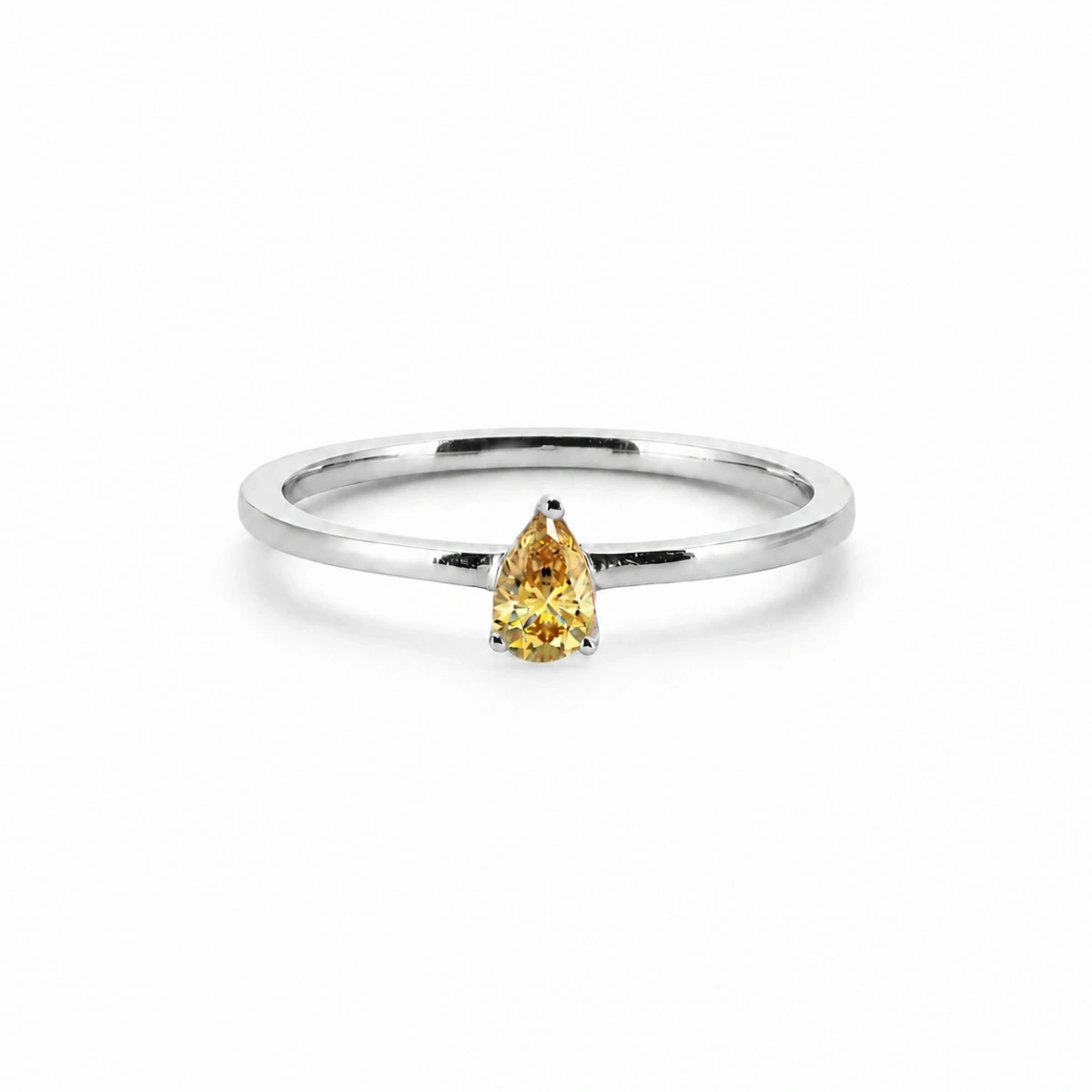 Ring aus Gold mit farbigem gelbem Tropfenstein