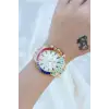 Clariss Trend Gold Metal Kordonlu Zirkon Taş Kaplama Renkli Taşlı Kasa Tasarımlı Lüx Kadın Kol Saati