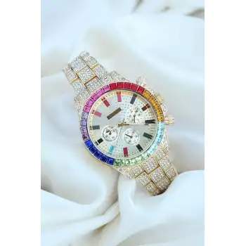 Clariss Trend Gold Metal Kordonlu Zirkon Taş Kaplama Renkli Taşlı Kasa Tasarımlı Lüx Kadın Kol Saati