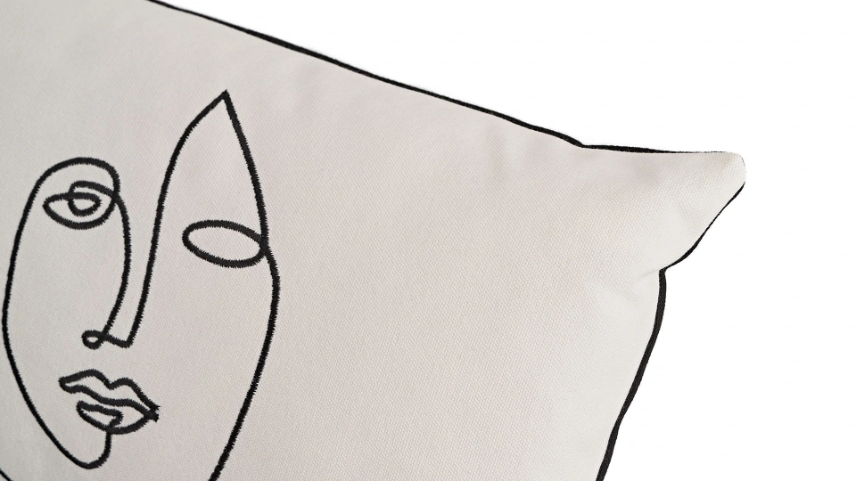 Embroidered Face Pillow