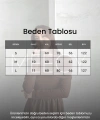 MNK MODEL GENİŞ ETEKLİ BÜZGÜ TESETTÜR ELBİSE