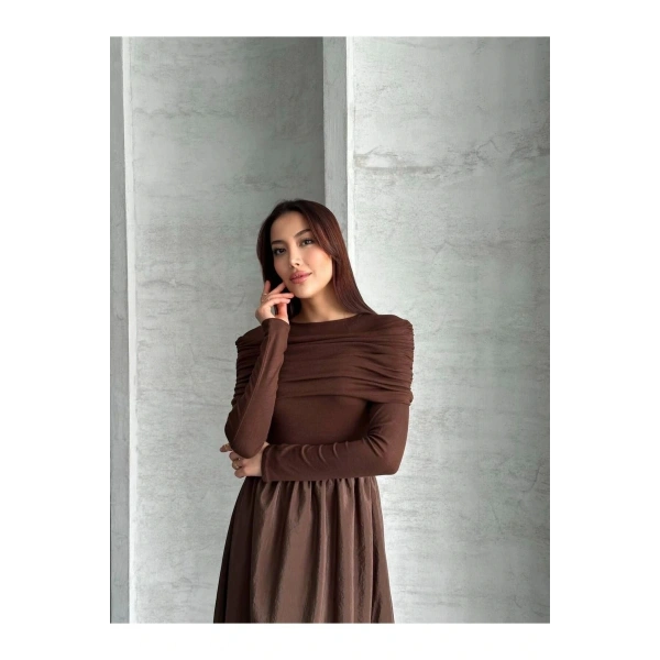 MNK MODEL GENİŞ ETEKLİ BÜZGÜ TESETTÜR ELBİSE