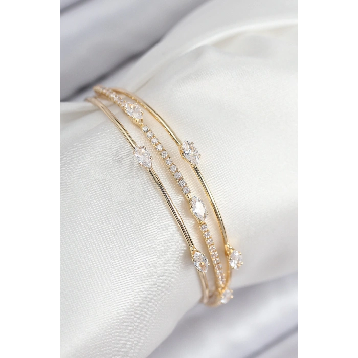 Pirinç Zirkon Taşlı Su Yolu Model Gold Renk Kadın Bileklik