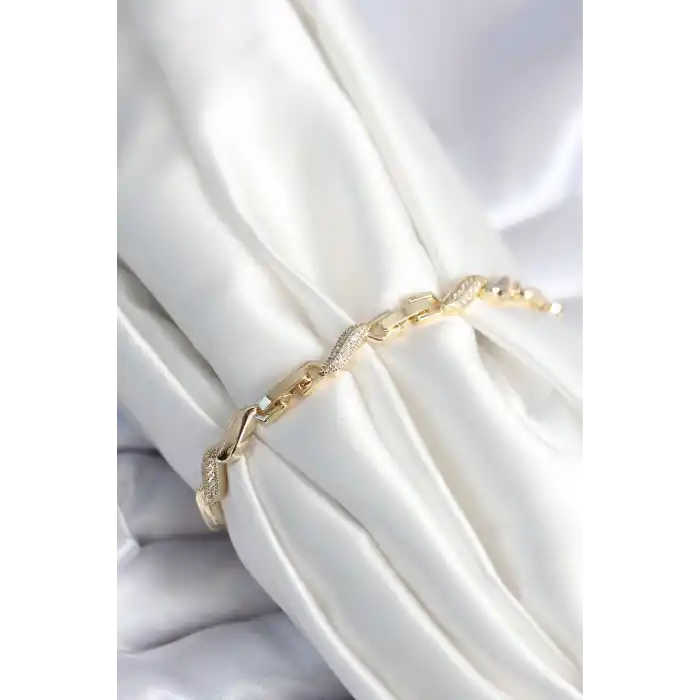 Pirinç Gold Renk Zirkon Taşlı Sarmal Model Kadın Bileklik