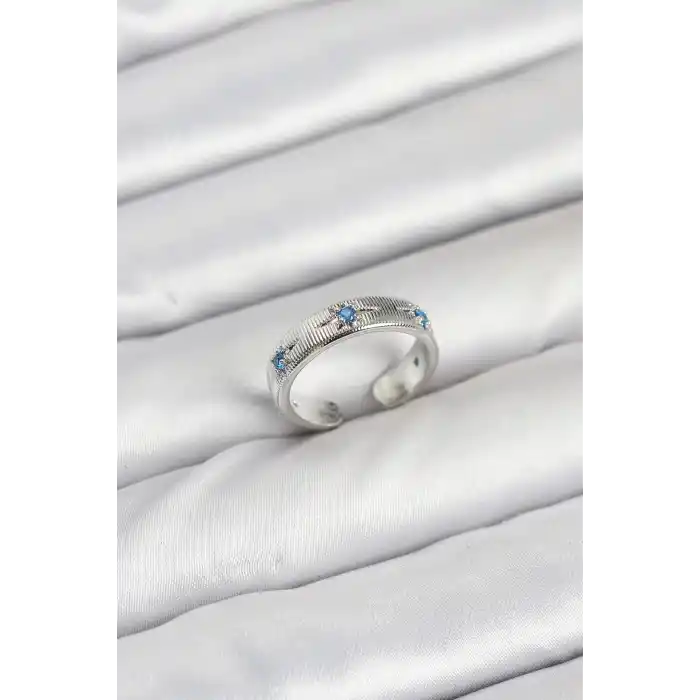 Pirinç Gümüş Renk Mavi Zirkon Taşlı Kutup Yıldızı Model Kadın Yüzük