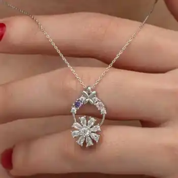 Gümüş Beyaz Dönen Çiçek Kadın Kolye