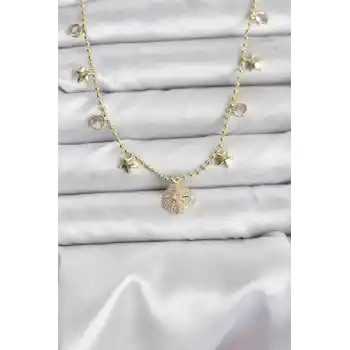 Pirinç Gold Renk Zirkon Taşlı Kutup Yıldızı Model Kadın Kolye