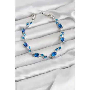 Pirinç Gümüş Renk Mavi Zirkon Taşlı Çiçek Model Kadın Bileklik