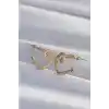 Pirinç Gold Renk Zirkon Taşlı Kıvrımlı Yarım Kalp Küpe