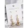 Pirinç Gold Renk Zirkon Taşlı Sallantılı Kalp Model Yarım Halka Detay 3 Çift Kadın Küpe Seti