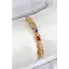 Pirinç Karışık Zirkon Taşlı Baget Model Gold Renk VIP Seri Kadın Bileklik