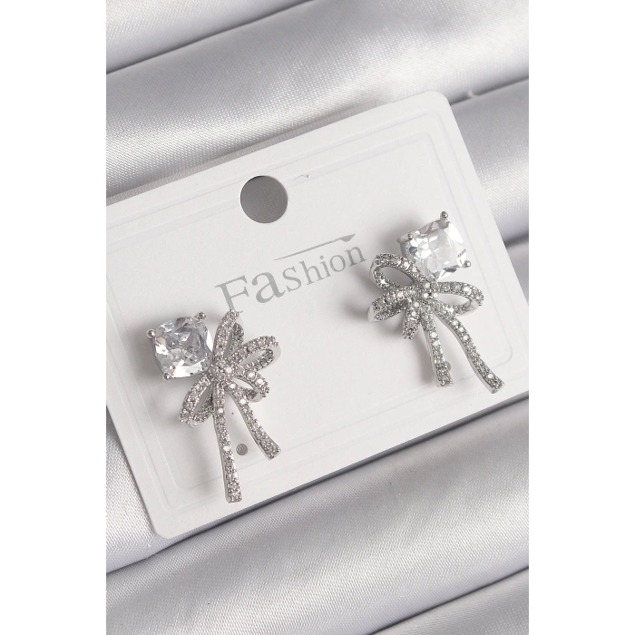 BFS Pirinç Gümüş Renk Zirkon Taşlı Kurdele Model Kadın Küpe