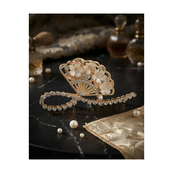 Çiçekli zirkon taşlı gold metal mandal toka