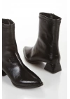 Kadın Siyah Rugan Sivri Burunlu Kalın Topuklu Rahat Kışlık Bot
