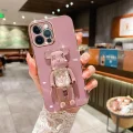 İphone 14 Glossy Yumuşak Ayıcıklı Boncuklu Stantlı Telefon Kılıfı