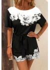 Kadın Tek Omuzu Açık çiçek Desenli Beli Kuşaklı Iki Iplik Mini Short Tulum
