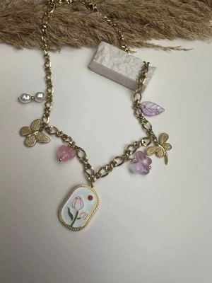 Çelik Figürlü Kolye