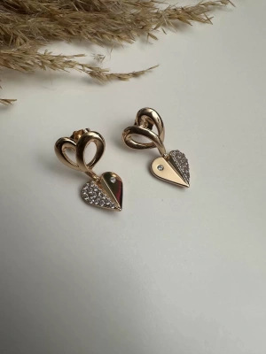 Çelik Kalp Figür Tasarım Küpe