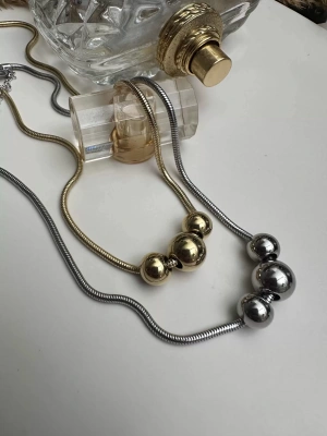 Çelik Kararmaz Üçlü Topçuk Model Kolye