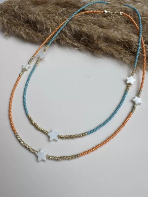 Dorika İçinde Yıldız Detaylı Boncuk Kolye