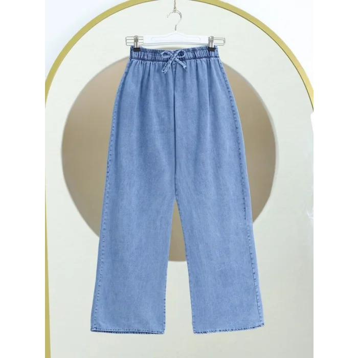 Bol Paça Beli Lastikli Bağcık Detaylı Kot Pantolon       -Mavi