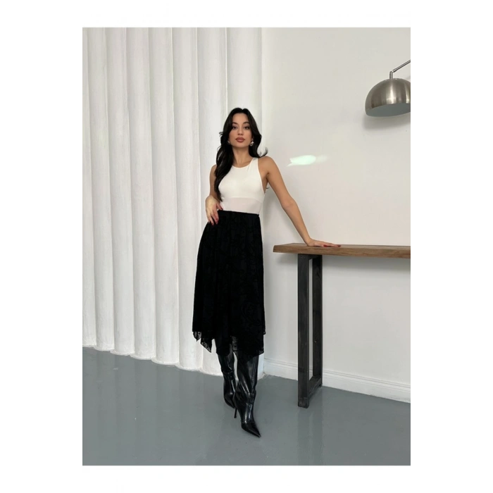 Siyah Yüksek Bel Midi Etek – Akışkan Kumaş, Asimetrik Kesim, Günlük & Davet Şıklığı