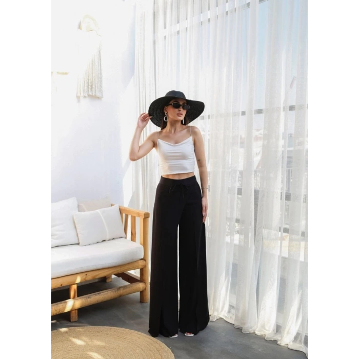 Keten Önü Çapraz Parçali Lasti̇kli̇ Ve Bağcikli Geni̇ş Paça Pantolon