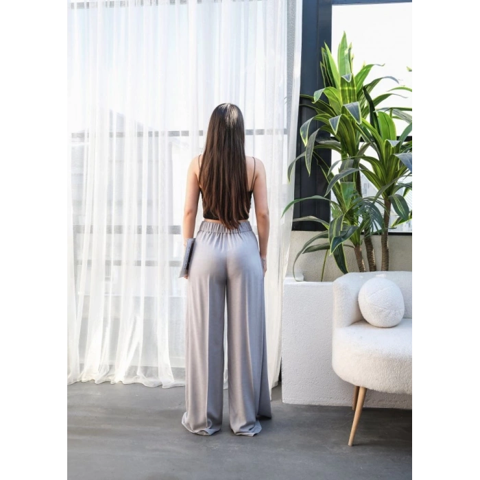 Keten Önü Çapraz Parçali Lasti̇kli̇ Ve Bağcikli Geni̇ş Paça Pantolon