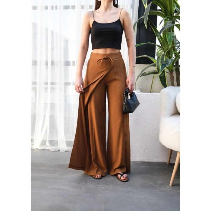 Keten Önü Çapraz Parçali Lasti̇kli̇ Ve Bağcikli Geni̇ş Paça Pantolon