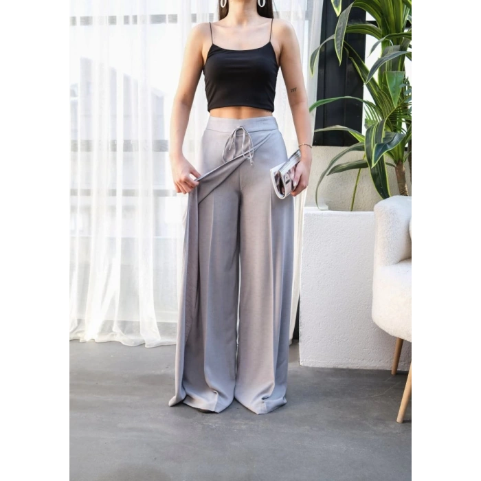 Keten Önü Çapraz Parçali Lasti̇kli̇ Ve Bağcikli Geni̇ş Paça Pantolon