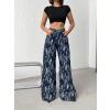 Mavi Yıkamalı Desenli Wide Leg Jean Pantolon
