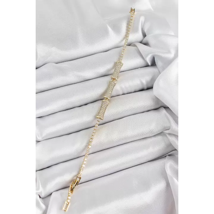 Pirinç Gold Renk Zirkon Taşlı Kemik Model Kadın Bileklik