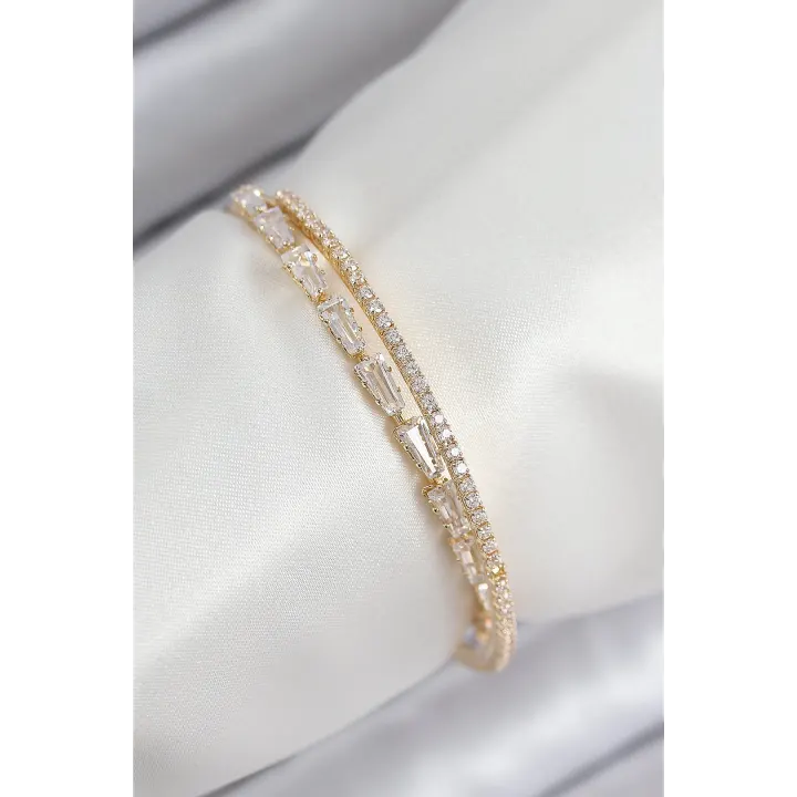 Pirinç Zirkon Taşlı Su Yolu Model Gold Renk Kadın Bileklik