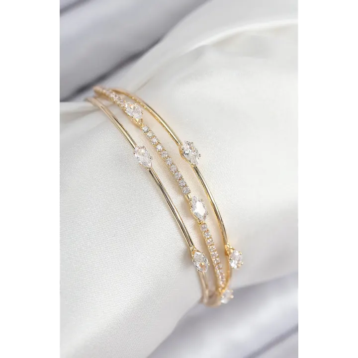 Pirinç Zirkon Taşlı Su Yolu Model Gold Renk Kadın Bileklik