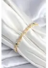 Pirinç Gold Renk Zirkon Taşlı Yonca Model Kadın Bileklik