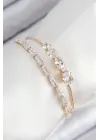 Pirinç Zirkon Taşlı Su Yolu Model Gold Renk Kadın Bileklik