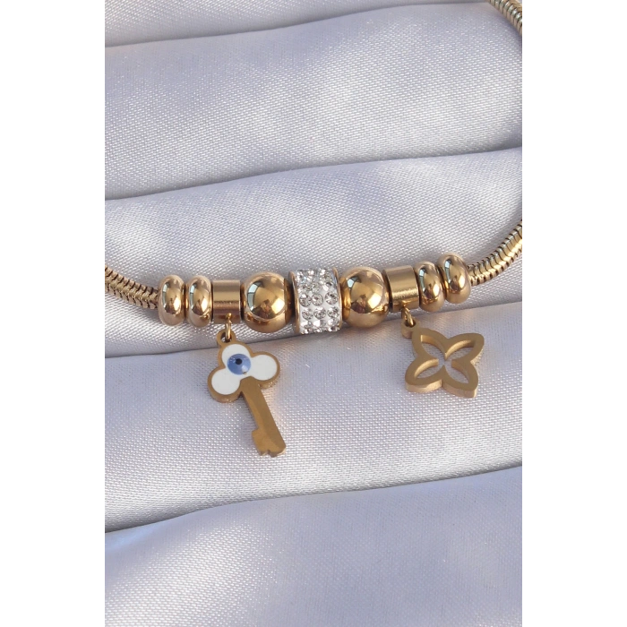 Dodes Dodes 316L Çelik Gold Renk Zirkon Taşlı Yonca Detay Nazarlı Anahtar Tasarımlı Bileklik TG27BB6203