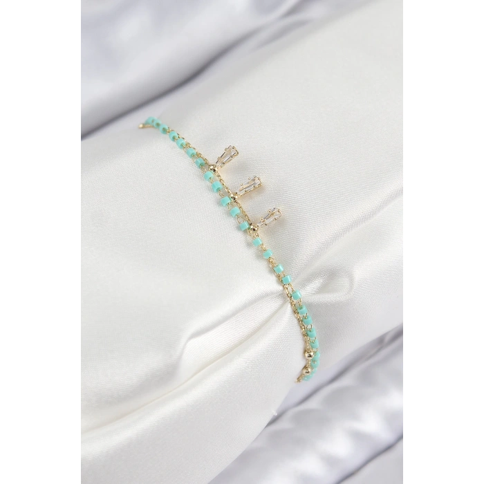 Dodes Dodes Pirinç Zirkon Taşlı Mavi Boncuklu Model Gold Renk Kadın Bileklik TG27BB7599