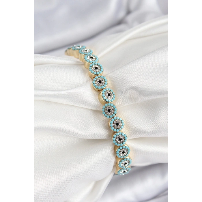 Dodes Dodes Pirinç Zirkon Taşlı Turkuaz Nazar Model Gold Renk Lastikli Kadın Bileklik TG27BB7496