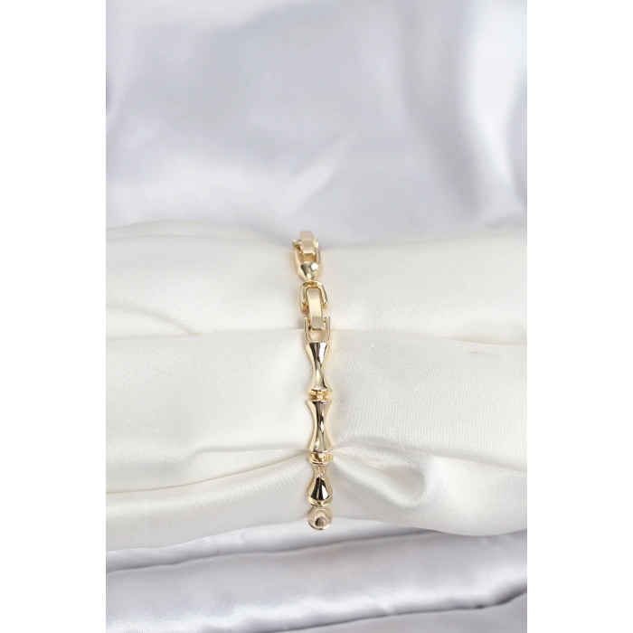 Pirinç Gold Renk VIP Seri Kemik Model Zirkon Taşlı Kadın Bileklik