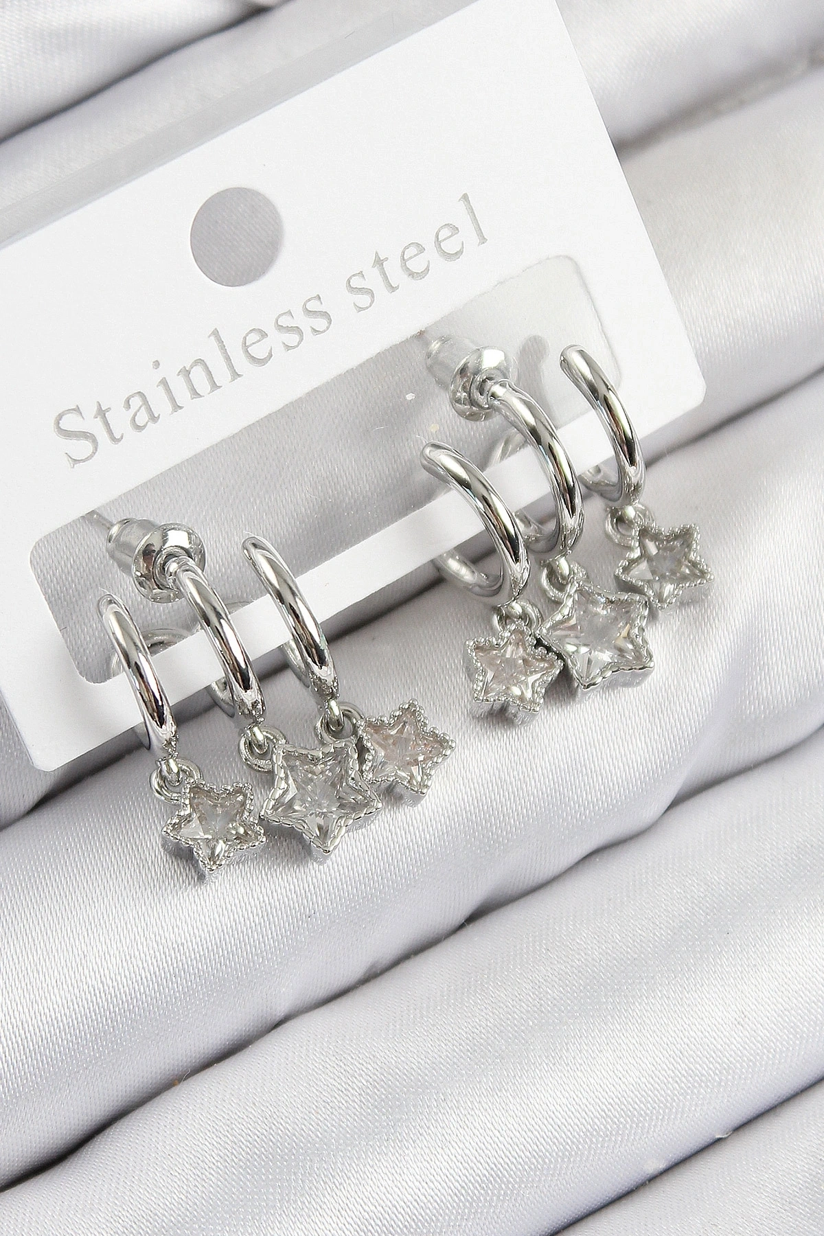 Pirinç Zirkon Taşlı Sallantılı Yıldız Model Gümüş Renk Kadın Küpe