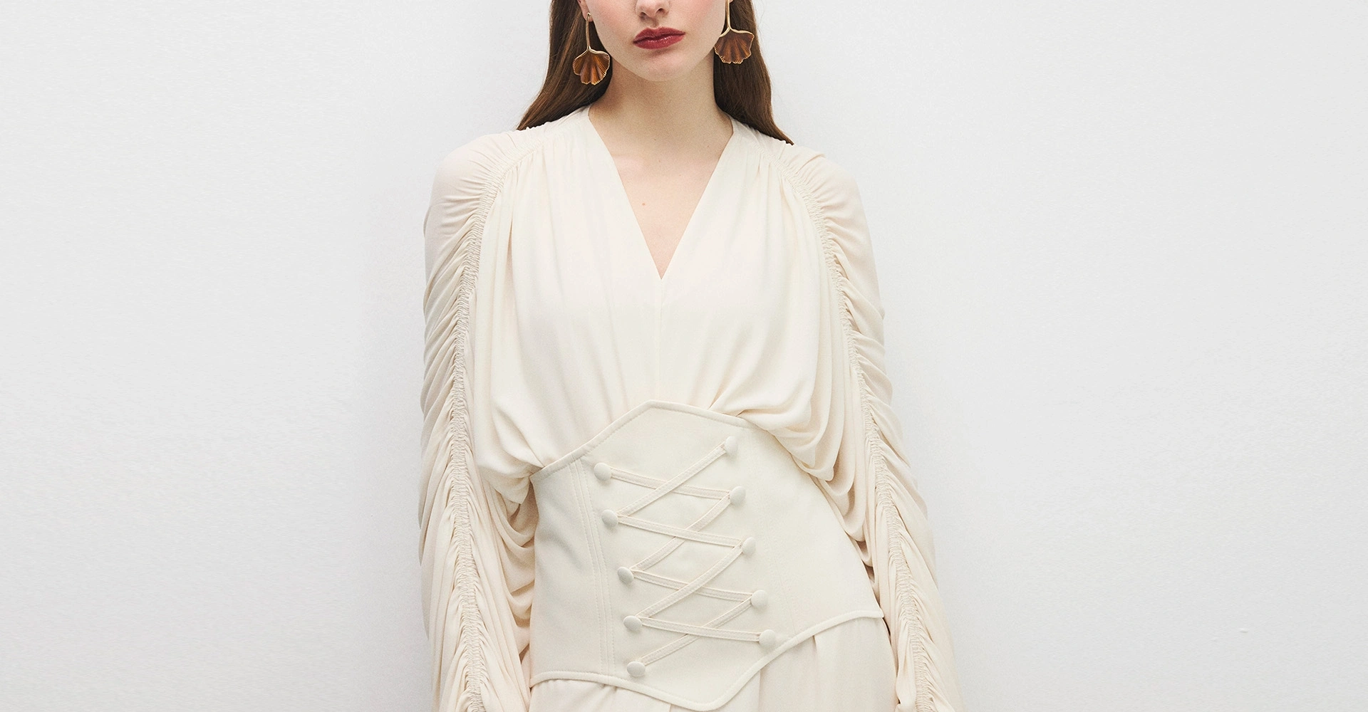 Long lines, delicate movement, and a calm expression of femininity.