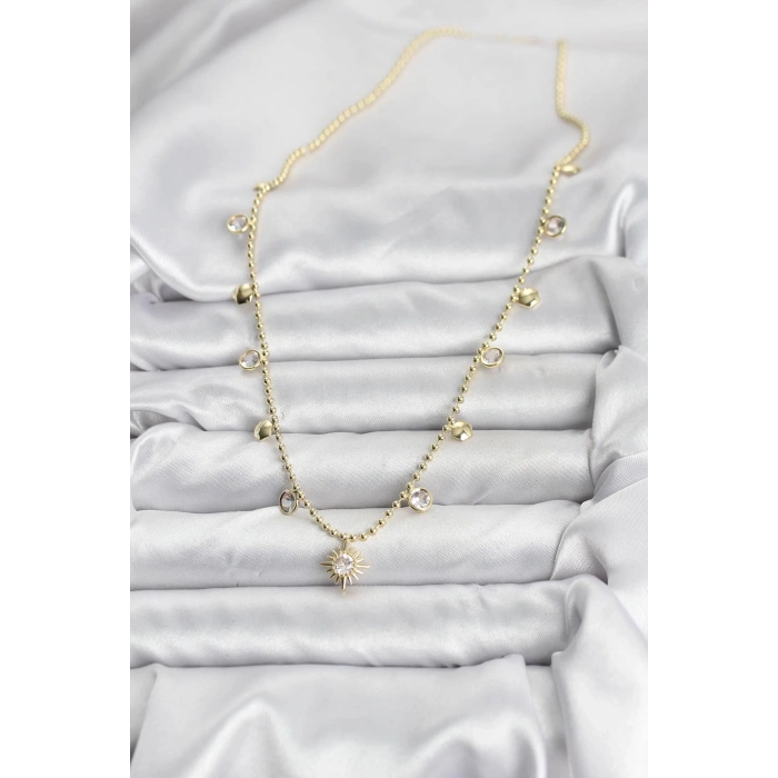 CEYLAN ADAM Zirkon Taşlı Kutup Yıldızı Model Pirinç Gold Renk Kadın Kolye