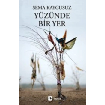 Yüzünde Bir Yer