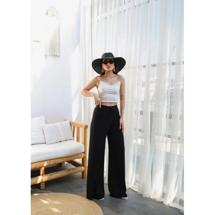 Keten Önü Çapraz Parçali Lasti̇kli̇ Ve Bağcikli Geni̇ş Paça Pantolon