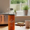 Premium Turuncu Kılıflı Cam Matara 750 ml – Sağlıklı Şıklık