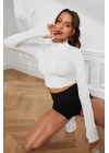 Kadın Beyaz Uzun Kol Fermuarlı Parmak Geçme Detaylı Dik Yaka Crop Top Bluz