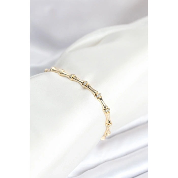 Pirinç Gold Renk Kemik Model Zirkon Taşlı Kadın Bileklik