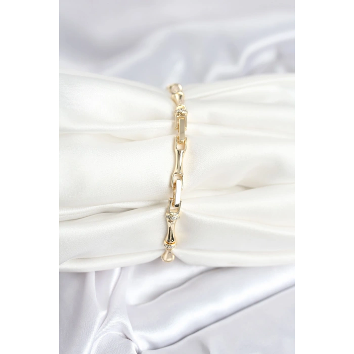 Pirinç Gold Renk Kemik Model Zirkon Taşlı Kadın Bileklik