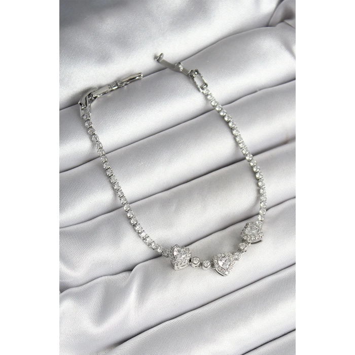 Pirinç Sıralı Kalp Figürlü Zirkon Taşlı Gümüş Renk Kadın Bileklik